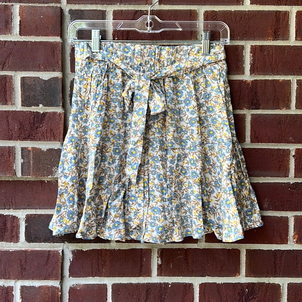 GeeGee belted skirt has shorts underneath and an elastic waist